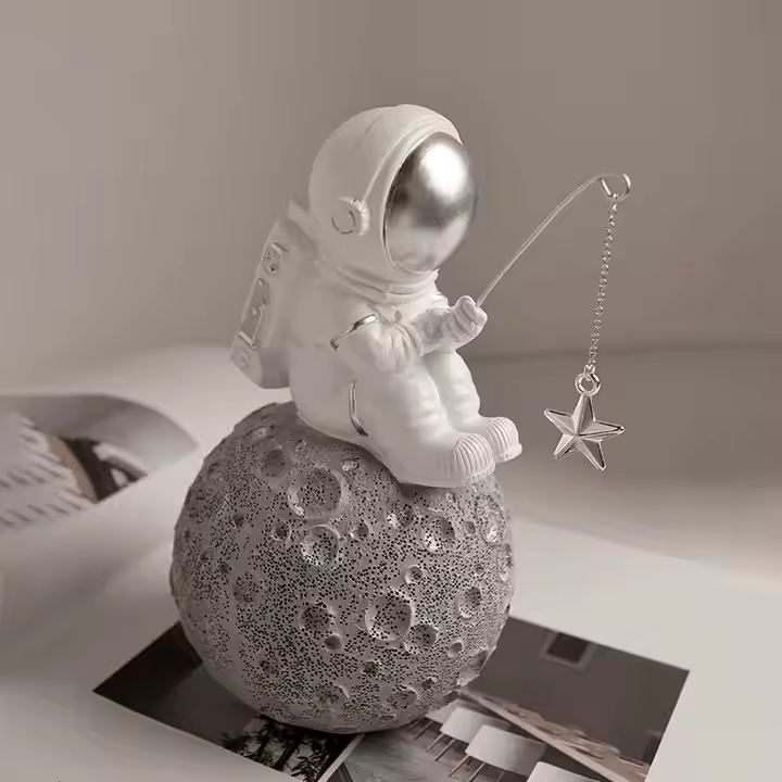 Astronaut Fishing Sculpture